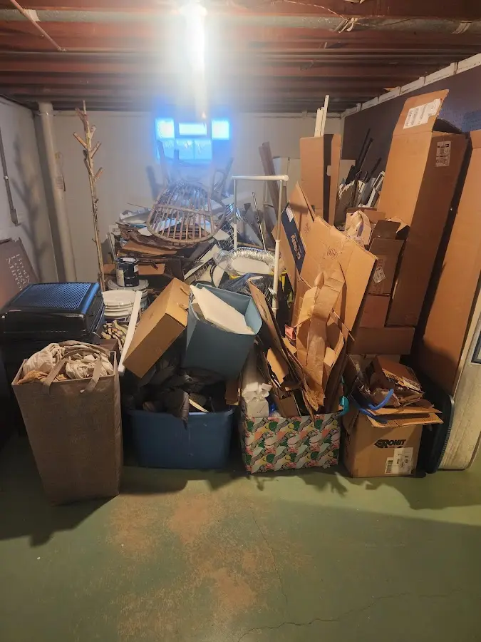 Roll-off dumpster container at job site for 2 Yard Dumpster Rental in Ashtabula